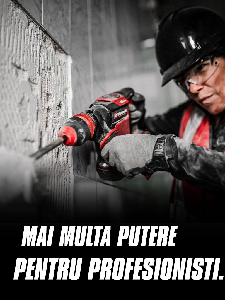 A person wearing safety glasses and a helmet uses a red drill on a wall, with the text "More Power for Pros".