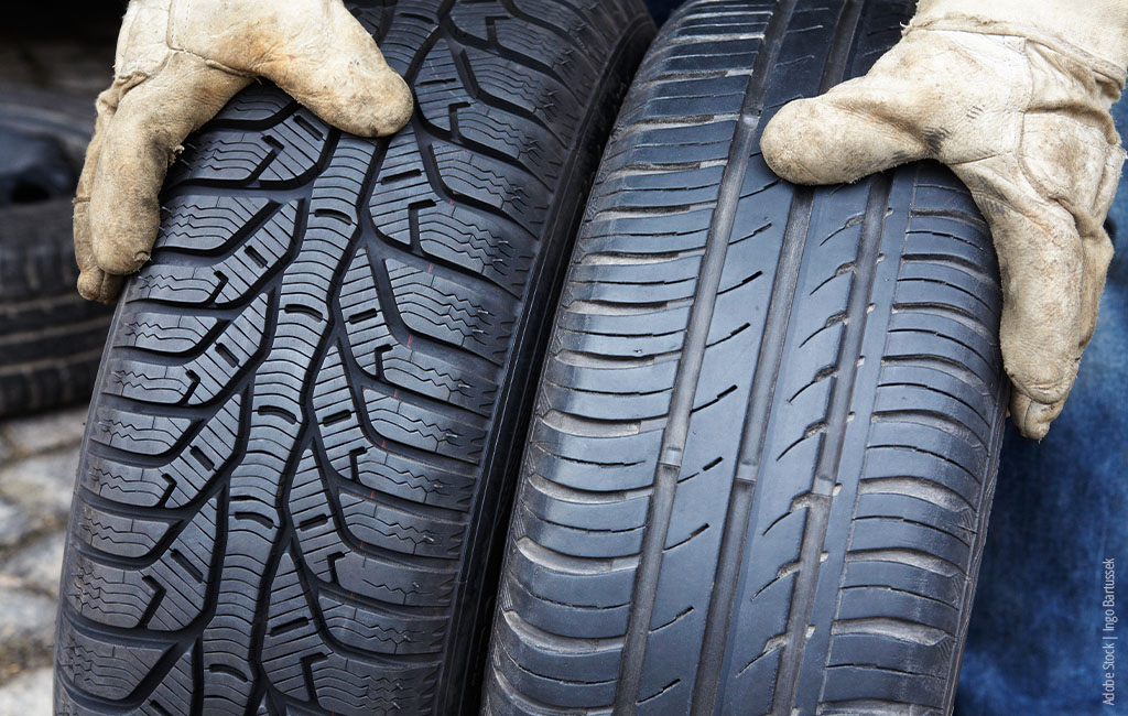 Someone is comparing the tread of summer and winter tyres