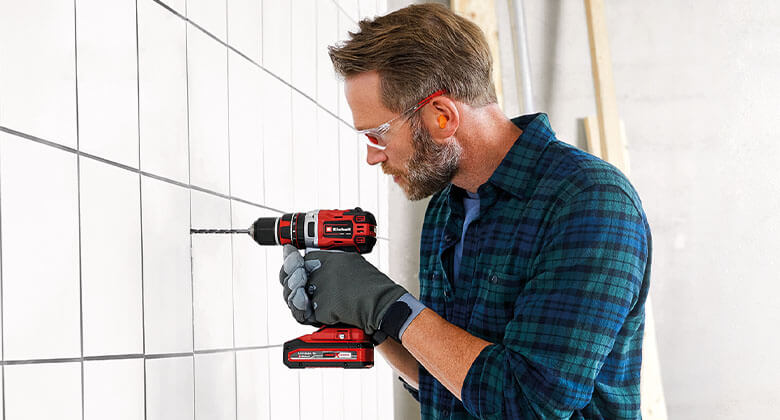 man using a cordless screwdriver