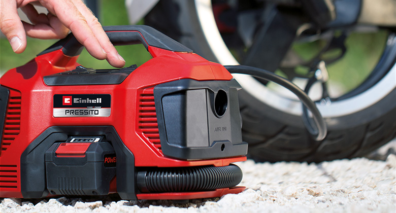 hybrid compressor pumps up motorbike tyres