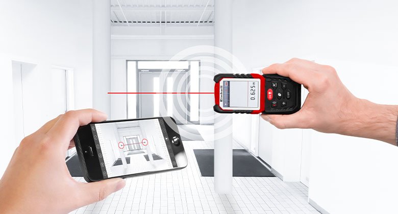 laser measuring tool in use