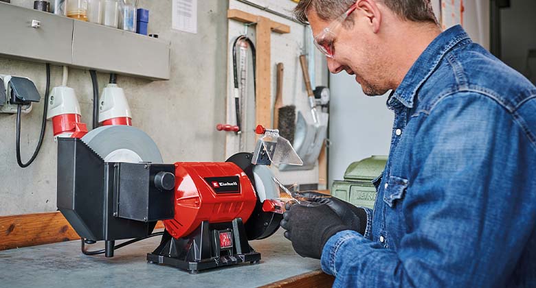 man using a wet-dry grinder