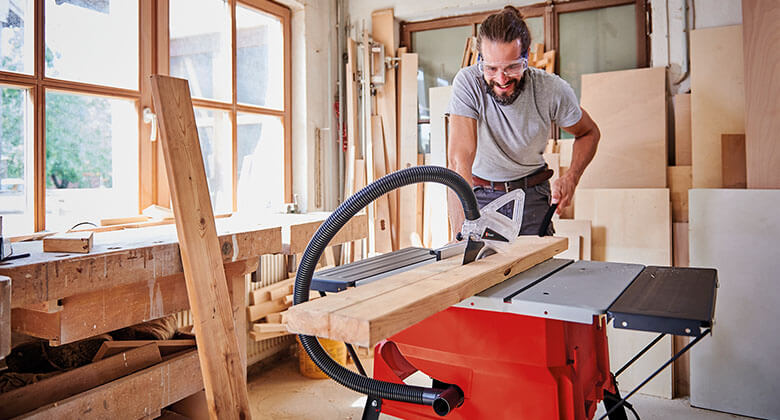 man working with a table saw